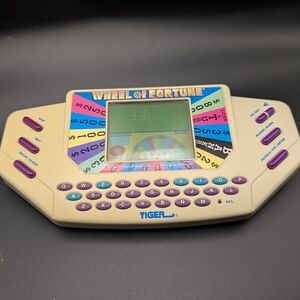 Tiger Wheel of Fortune Handheld Game - Cream and Purple